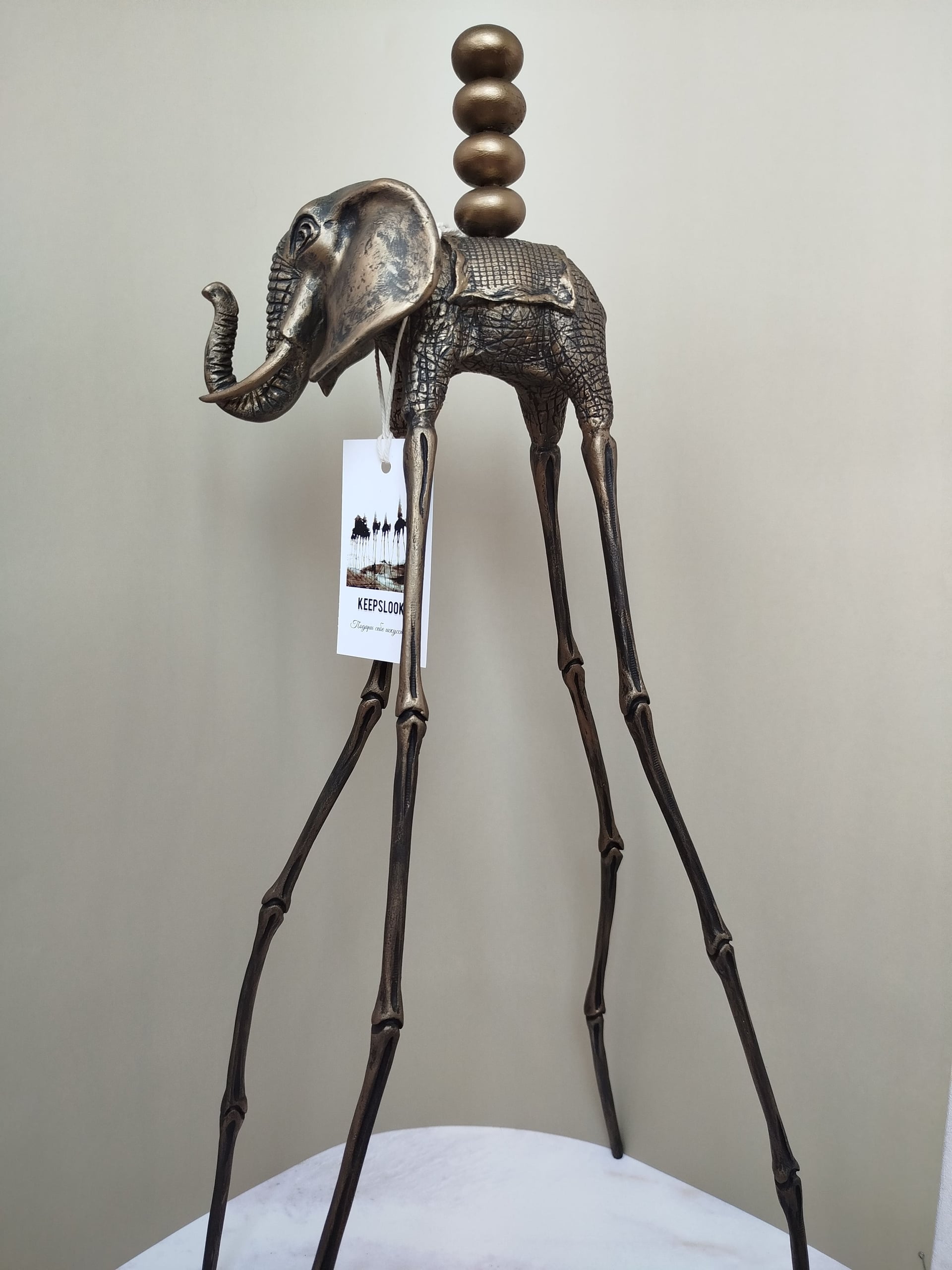 Авторская статуэтка слона "Идущий" с декоративными камнями и патиной под старую бронзу — готовая работа